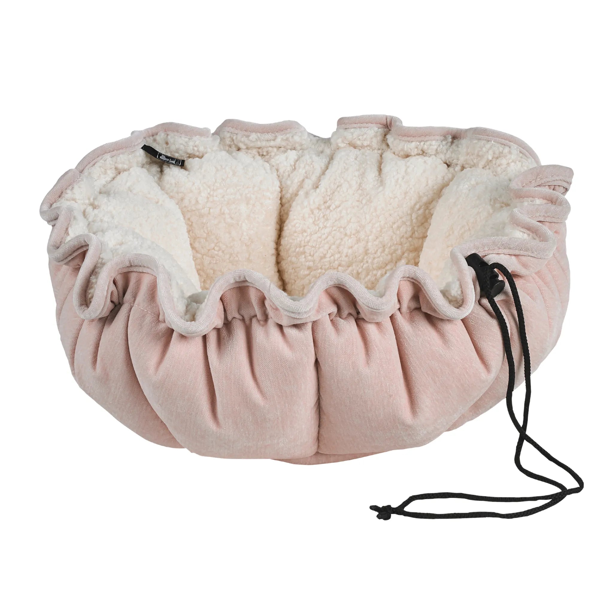 Pink and white pet bed with drawstring on a white background