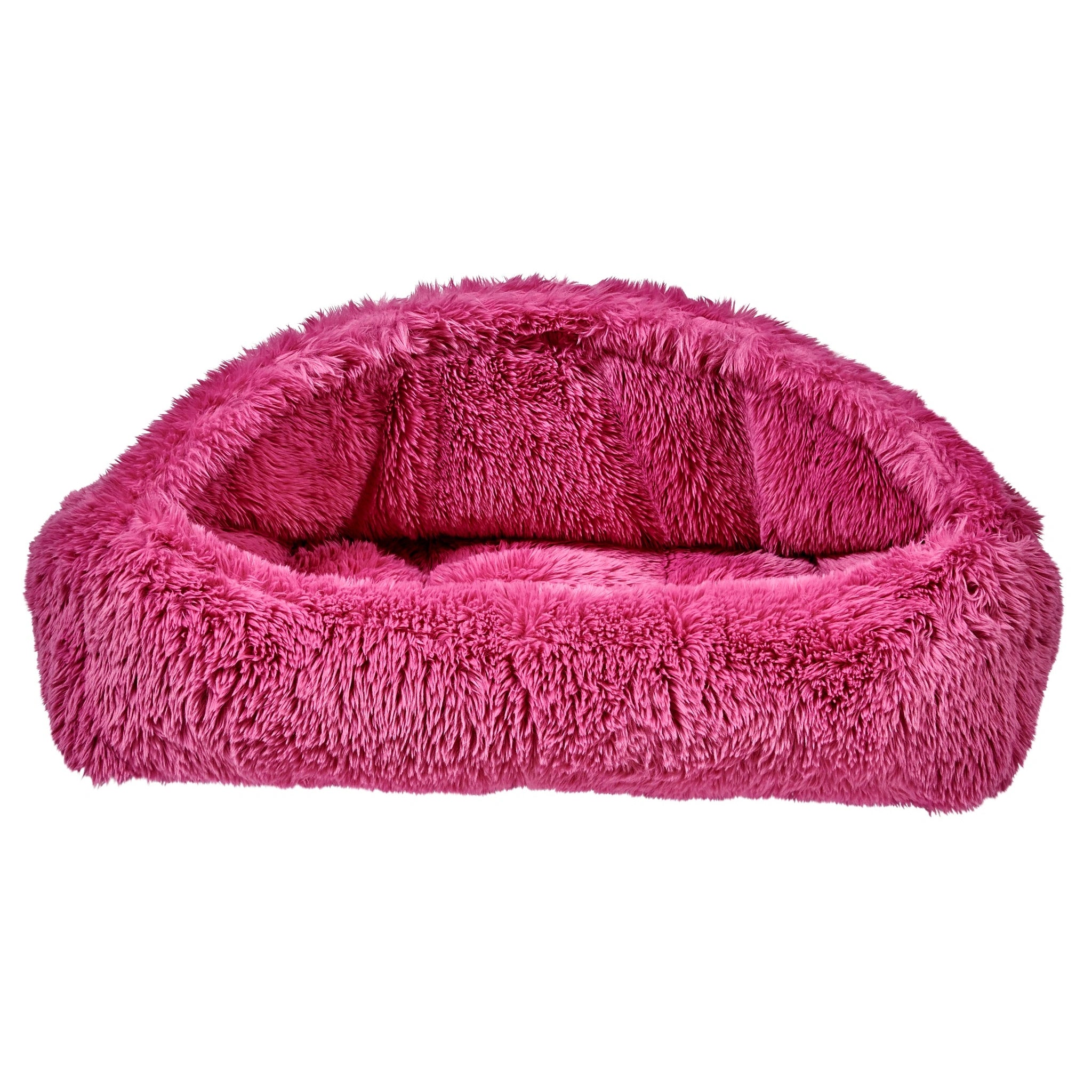 Pink fluffy pet bed on a white background