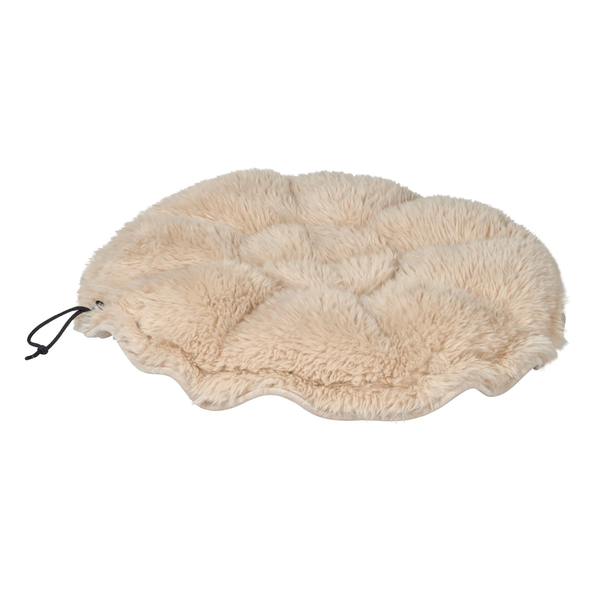 Beige sheepskin rug on a white background