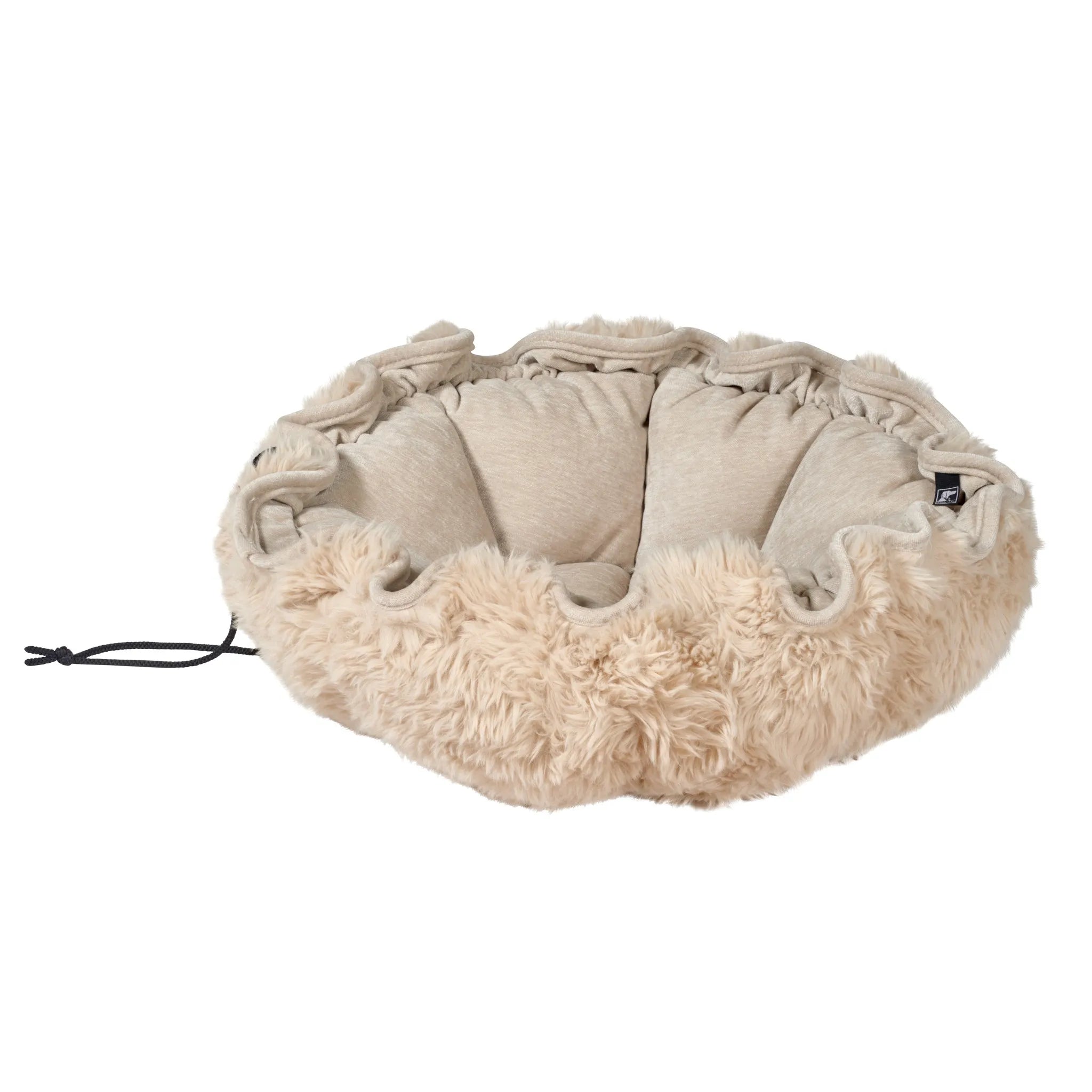 Round pet bed with fluffy texture on a white background