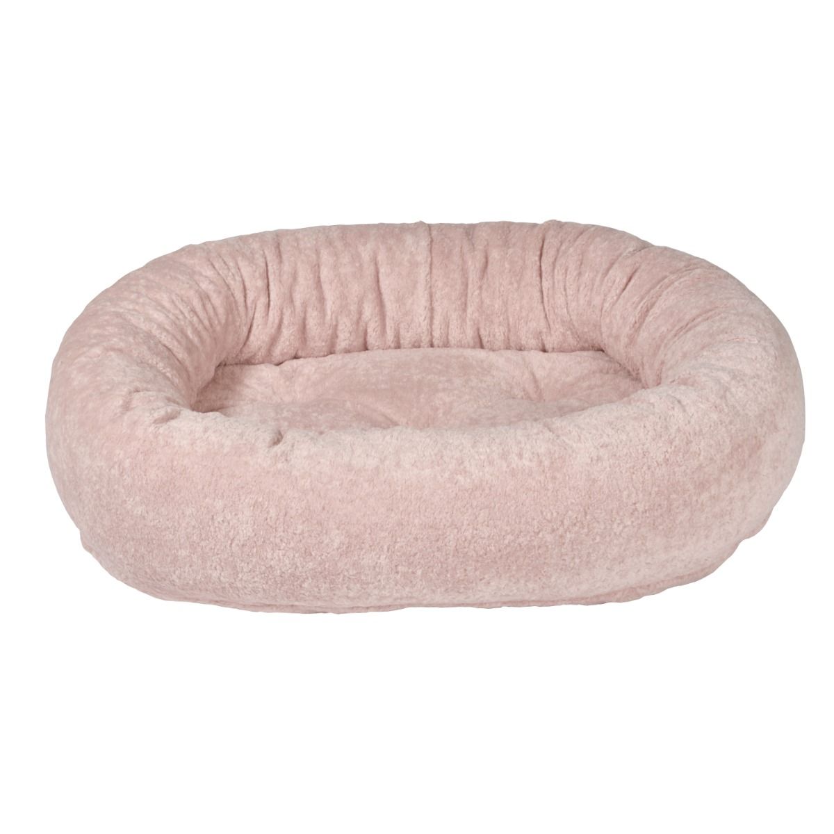 Pink donut-shaped pet bed on a white background